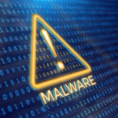 The outline of a yellow triangle with an exclamation point in the center sits in the middle of a dotted dark blue background. Under the triangle is the word malware.